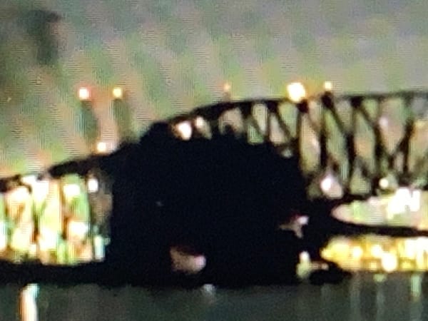 Screenshot of image of container ship striking the Key Bridge
