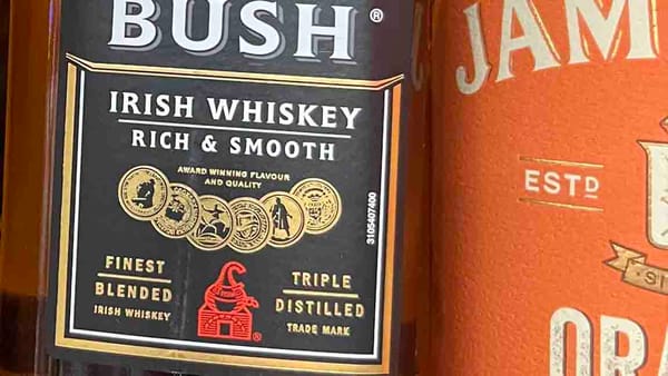 Cropped of image of two whiskey labels with BUSH and JAM legible