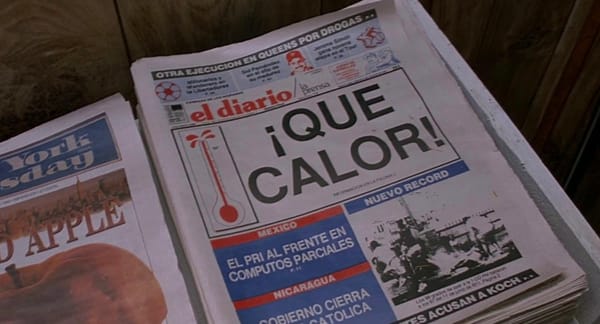Image from DO THE RIGHT THING of newspaper EL DIARIO with image of an overflowing thermometer and headline ¡QUE CALOR!