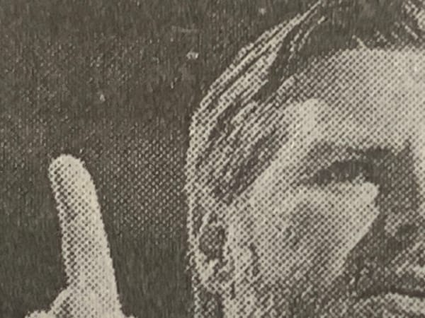 Detail of New York Times photo of JD Vance holding up an index finger