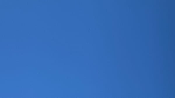 A patch of perfectly featureless deep blue sky